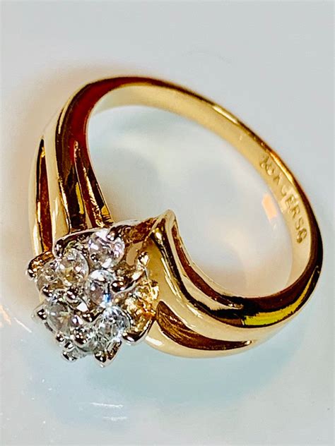 18k ge ring with diamonds.